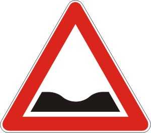 Znak    ''ulegnuce kolovoza''